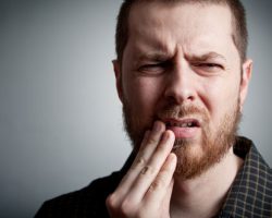 Image of a man with an abscess at Irvine Dentistry.